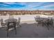 Rooftop deck area with outdoor seating and panoramic views of the city skyline at 1155 N Ash St # 806, Denver, CO 80220