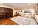 Finished basement boasts a home office and comfortable seating area at 3383 Mount Royal Dr # 46, Castle Rock, CO 80104