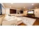 Finished basement with large sectional sofa, TV, and fireplace at 3383 Mount Royal Dr # 46, Castle Rock, CO 80104