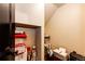 Basement storage area with shelving and a printer at 3383 Mount Royal Dr # 46, Castle Rock, CO 80104