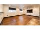 Bright basement featuring hardwood floors and natural light at 3383 Mount Royal Dr # 46, Castle Rock, CO 80104