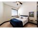 Charming bedroom with a ceiling fan and window at 3383 Mount Royal Dr # 46, Castle Rock, CO 80104