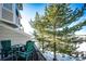 Deck with seating area and view of snowy landscape at 3383 Mount Royal Dr # 46, Castle Rock, CO 80104