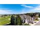 A lovely view showcases the exterior of this home with a three car garage and well-manicured lawns at 3383 Mount Royal Dr # 46, Castle Rock, CO 80104