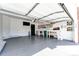 Organized garage with epoxy floors, storage, and work bench at 3383 Mount Royal Dr # 46, Castle Rock, CO 80104