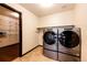 Well-organized laundry room with modern washer and dryer at 3383 Mount Royal Dr # 46, Castle Rock, CO 80104