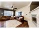Relaxing living room with leather furniture and fireplace at 3383 Mount Royal Dr # 46, Castle Rock, CO 80104