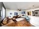 Spacious living room with a fireplace and hardwood floors at 3383 Mount Royal Dr # 46, Castle Rock, CO 80104