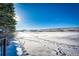 Snowy landscape view from deck with distant homes visible at 3383 Mount Royal Dr # 46, Castle Rock, CO 80104