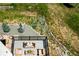 Aerial view of backyard deck featuring lounge seating and landscaping at 29822 Troutdale Scenic Dr, Evergreen, CO 80439