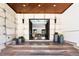 Grand entrance featuring tile flooring, a wooden ceiling, and double doors to the house at 29822 Troutdale Scenic Dr, Evergreen, CO 80439
