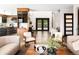 Spacious foyer with an open floor plan, wood floors, and stylish modern decor at 29822 Troutdale Scenic Dr, Evergreen, CO 80439