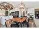 Dining area featuring a pot rack and views at 9531 Desert Willow Way, Highlands Ranch, CO 80129