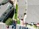 Aerial view of the property showcasing the unit's layout, parking area, and the surrounding complex at 970 S Dawson Way # 9, Aurora, CO 80012