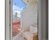 Cozy balcony with comfortable chair and outdoor lighting, perfect for relaxing at 970 S Dawson Way # 9, Aurora, CO 80012