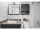 Bathroom with vanity and toilet with storage at 970 S Dawson Way # 9, Aurora, CO 80012