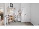 Brightly lit, simple study with a calendar and desk at 970 S Dawson Way # 9, Aurora, CO 80012