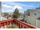 View of building exterior and parking with beautiful sunny sky in background at 970 S Dawson Way # 9, Aurora, CO 80012