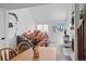 Bright living room features vaulted ceilings, fireplace, and an inviting seating area at 970 S Dawson Way # 9, Aurora, CO 80012