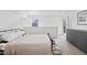 Well-lit main bedroom provides plenty of space, plus a dresser and access to a private balcony at 970 S Dawson Way # 9, Aurora, CO 80012