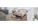 Spacious main bedroom offering a cozy bed, dresser, vanity, and pet beds on soft, neutral carpeting at 970 S Dawson Way # 9, Aurora, CO 80012
