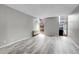 Spacious bedroom featuring wood-look floors and lots of natural light at 2500 S York St # 115, Denver, CO 80210