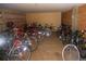 Secured bicycle storage area in a well-lit room with multiple bikes at 2500 S York St # 115, Denver, CO 80210