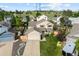 Aerial view of a two-story house with a two-car garage, lush lawn, and driveway art at 11100 Callaway Ct, Parker, CO 80138