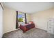 Bedroom with a single bed, carpeted floors, a window with natural light and a closet for storage at 11100 Callaway Ct, Parker, CO 80138