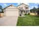 Charming two-story home with a manicured lawn and a two-car garage in a desirable neighborhood at 11100 Callaway Ct, Parker, CO 80138
