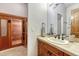 Bathroom with sauna, vanity, sink, and tiled floors providing a convenient space to unwind and relax at 2597 Oak Vista Ct, Castle Rock, CO 80104