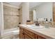Bathroom featuring tiled walls and a vanity with tile counter top at 2597 Oak Vista Ct, Castle Rock, CO 80104