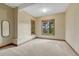Bright and airy bedroom with neutral paint, plush carpet and many windows providing natural light at 2597 Oak Vista Ct, Castle Rock, CO 80104