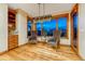 Charming breakfast nook area with custom lighting and natural light at 2597 Oak Vista Ct, Castle Rock, CO 80104