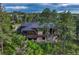 Beautifully set among mature trees, this house features a large back deck perfect for outdoor entertaining at 2597 Oak Vista Ct, Castle Rock, CO 80104