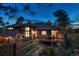 Inviting two-story home boasts a spacious deck perfect for outdoor entertaining and al fresco dining at 2597 Oak Vista Ct, Castle Rock, CO 80104