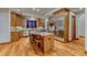 Updated kitchen with granite countertops, stainless appliances, and ample cabinet space at 2597 Oak Vista Ct, Castle Rock, CO 80104