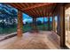 Covered outdoor area with stone columns provides a tranquil setting with views of the surrounding nature at 2597 Oak Vista Ct, Castle Rock, CO 80104