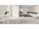 Finished basement area features a table with chairs, an open space and white walls at 7579 Jay Ct, Arvada, CO 80003