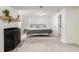 Bedroom features gray carpet, white walls, and natural lighting from a window at 7579 Jay Ct, Arvada, CO 80003