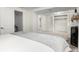 Bedroom features gray carpet, white walls, and a small walk-in closet at 7579 Jay Ct, Arvada, CO 80003