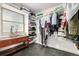 Walk-in closet with built-in shelving and storage with natural lighting from window at 7579 Jay Ct, Arvada, CO 80003