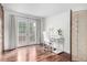 Bright office featuring hardwood floors, french doors, and minimalist décor at 7579 Jay Ct, Arvada, CO 80003