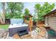 Outdoor hot tub nestled on stone pavers and wooden boardwalk at 7579 Jay Ct, Arvada, CO 80003