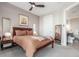 Bedroom with hardwood floors, a cozy bed, and ensuite bathroom at 4200 W 17Th Ave # 508, Denver, CO 80204