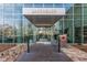 Modern condo building featuring floor-to-ceiling windows and sleek architectural details at main entrance at 4200 W 17Th Ave # 508, Denver, CO 80204