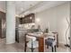 Well-designed kitchen and dining area featuring modern finishes and open layout for easy entertaining at 4200 W 17Th Ave # 508, Denver, CO 80204
