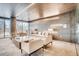 Stylish lounge features modern furnishings, wood paneling, and ample natural light from large windows at 4200 W 17Th Ave # 508, Denver, CO 80204