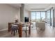 Open-concept living space with modern furniture and expansive windows offering stunning outdoor views at 4200 W 17Th Ave # 508, Denver, CO 80204