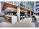 Inviting outdoor seating area with a bar, tables, and views of the surrounding landscape at 4200 W 17Th Ave # 508, Denver, CO 80204